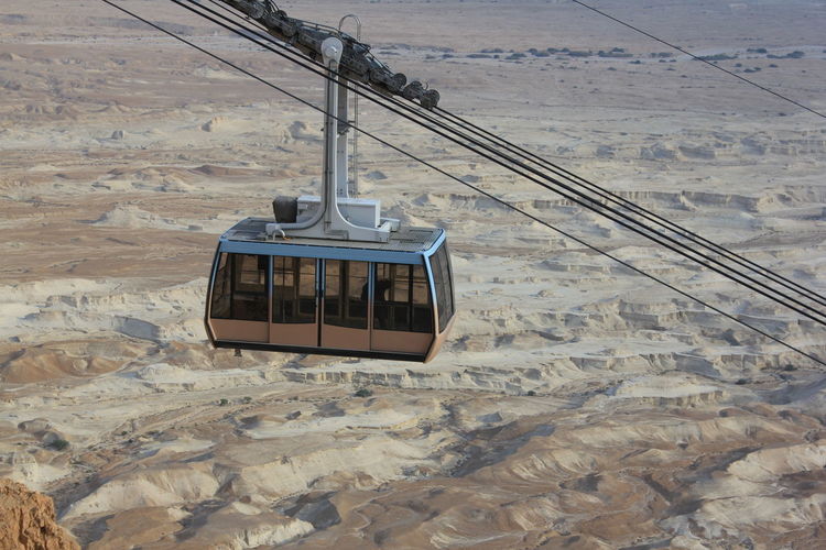 High angle view of overhead cable car over desert landscape