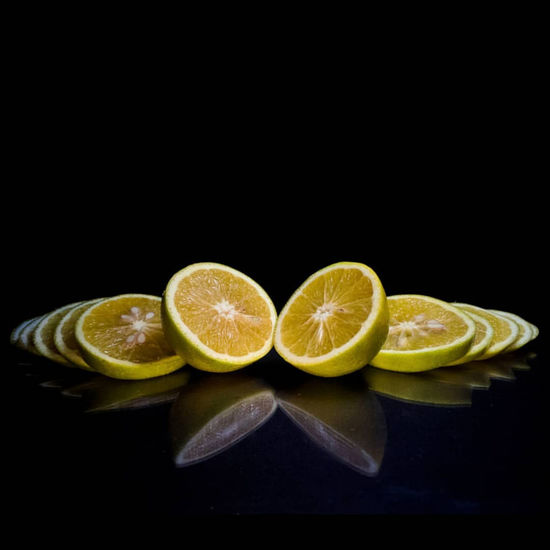 Close-up of fruits against black background