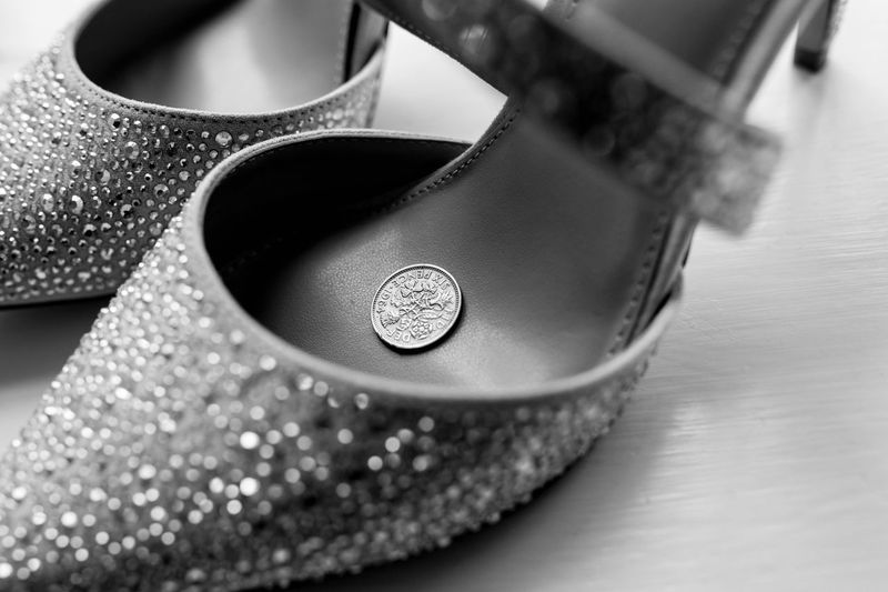 Close up of shoe with sixpence in 