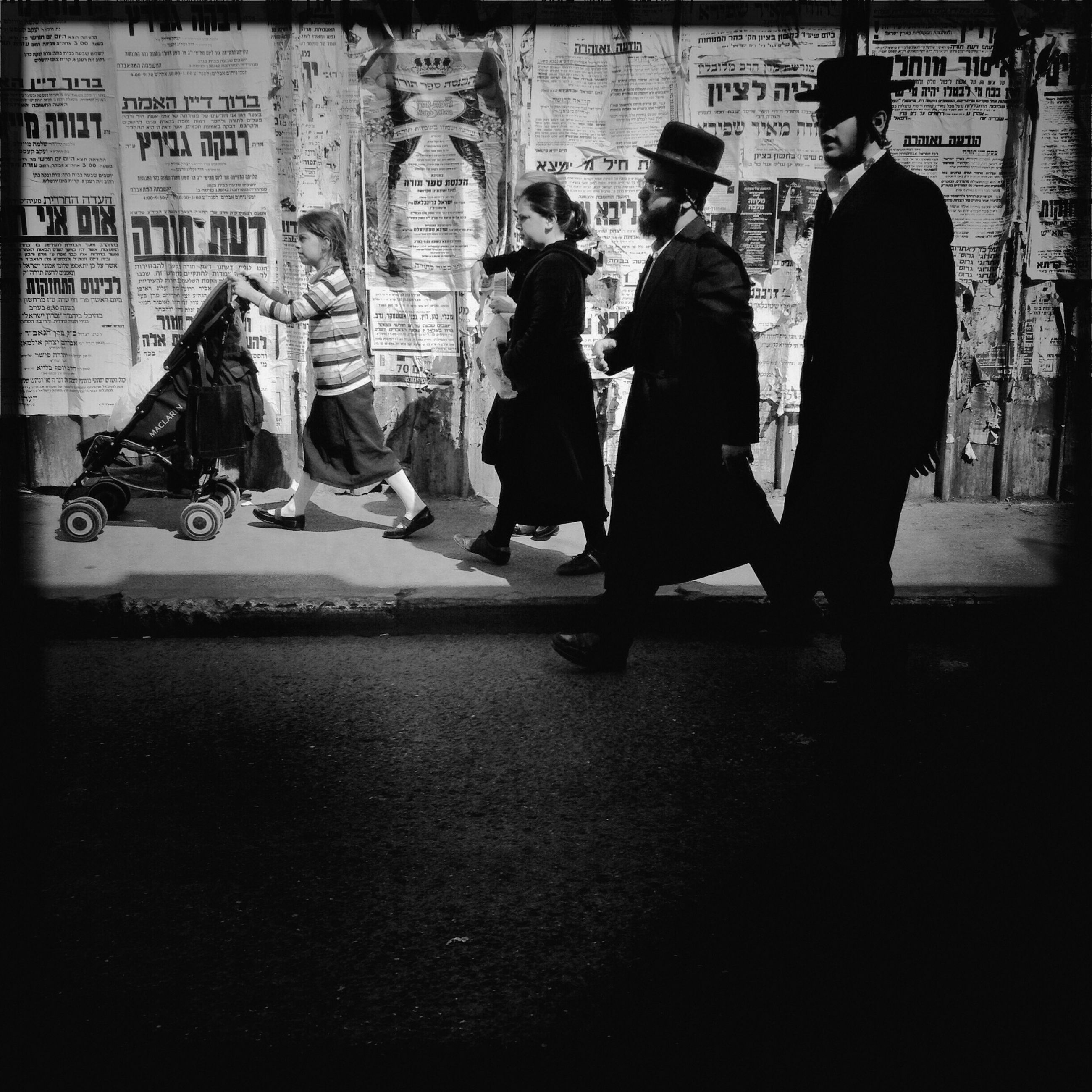 men, lifestyles, transfer print, person, street, large group of people, leisure activity, walking, auto post production filter, full length, city life, city, togetherness, medium group of people, road, rear view, group of people, casual clothing