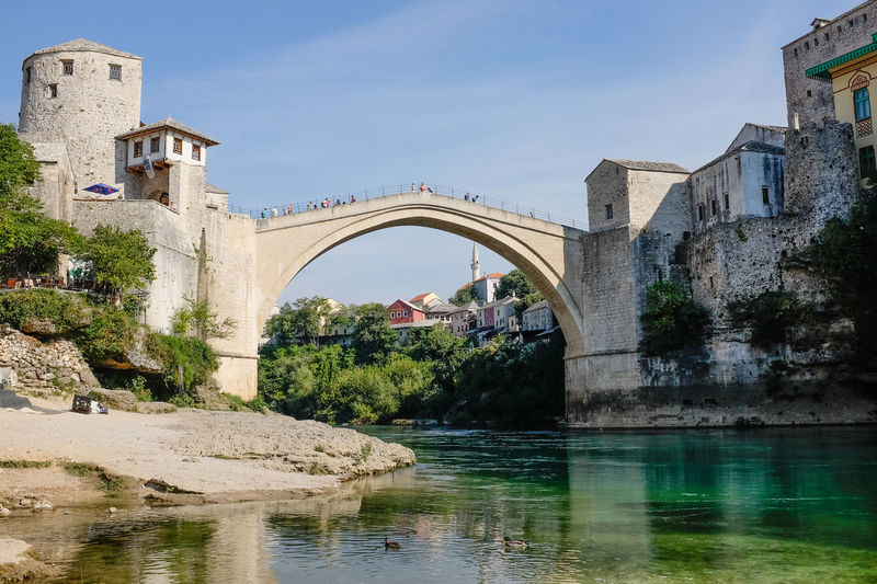 Bridge over river against sky