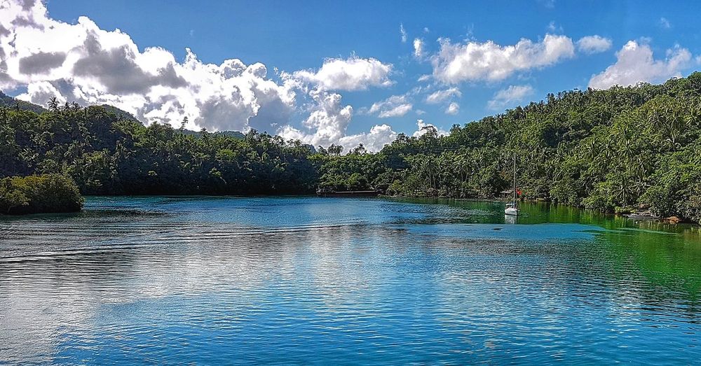 Panoramic view of landscape against blue sky