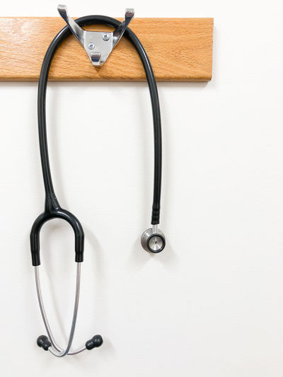 Stethoscope hanging on wall