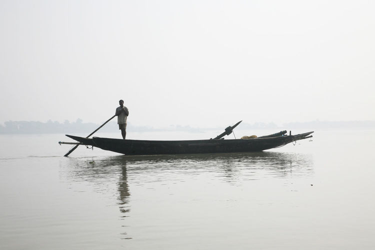 Misty morning on the holiest of rivers in india. ganges delta in sundarbans, west bengal, india