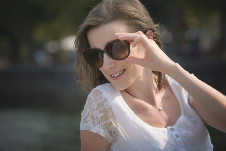 Portrait of woman wearing sunglasses