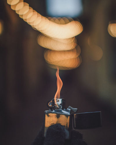 Close-up of flame on cigarette lighter