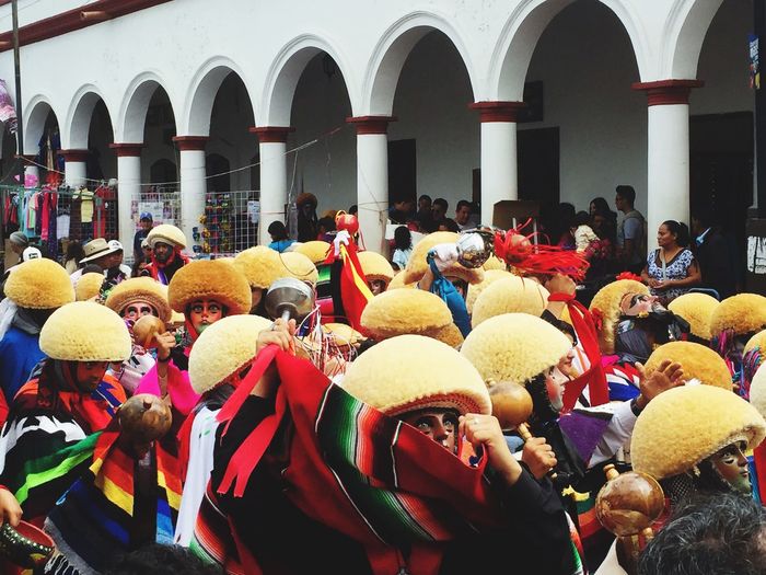 People wearing costume during traditional festival