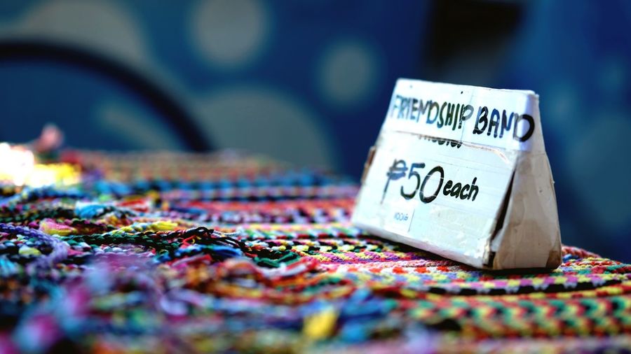 Close-up of price tag at market stall