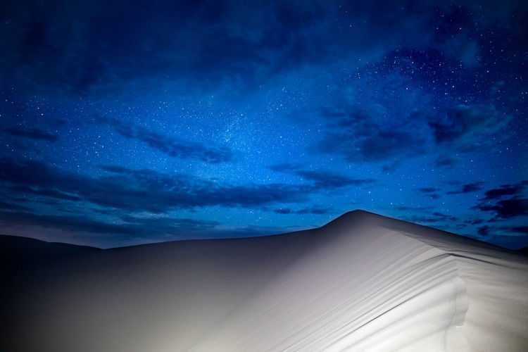 Low angle view of blue sky at night