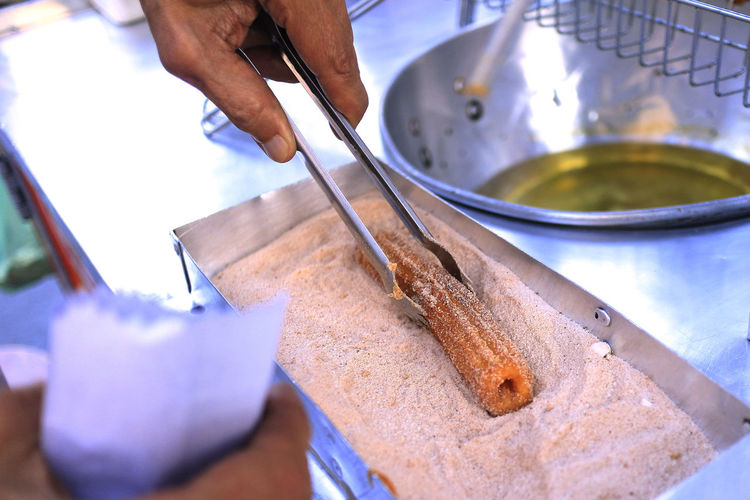 Close-up of man preparing food
