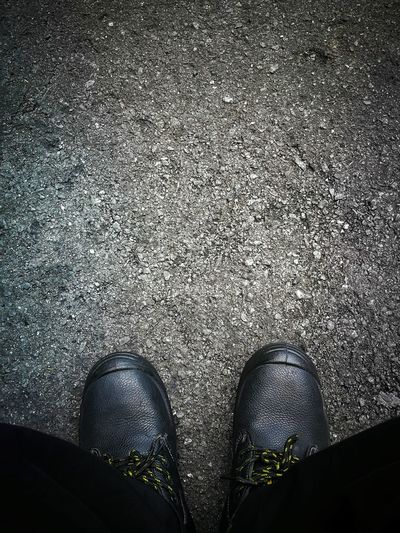Low section of man standing on floor