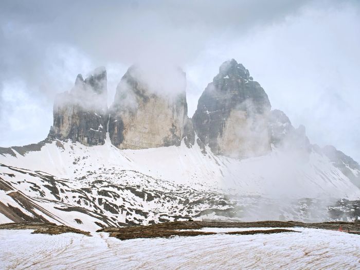 North side of sexten dolomites symbol - tre cime. may view from popular trail around the rocks