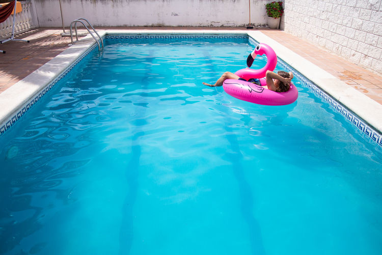 High angle view of woman in swimming pool