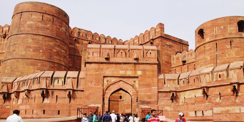 People at entrance of agra fort