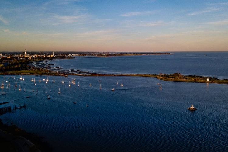 High angle view of sea against sky during sunset