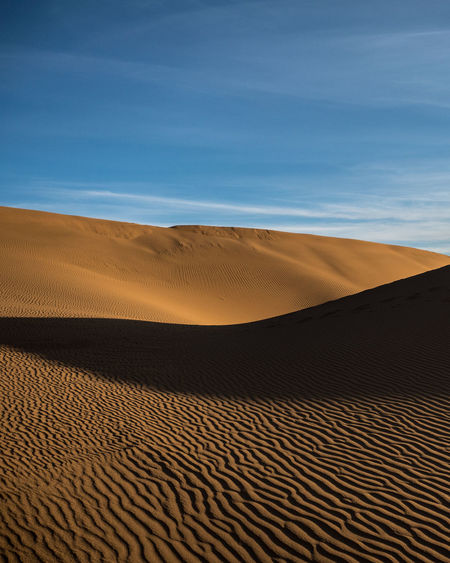 Scenic view of desert against sky