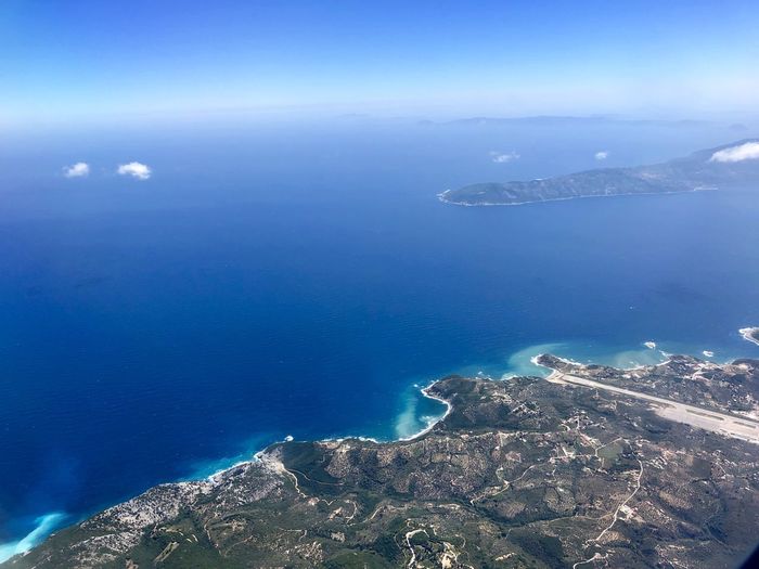 Aerial view of island amidst sea