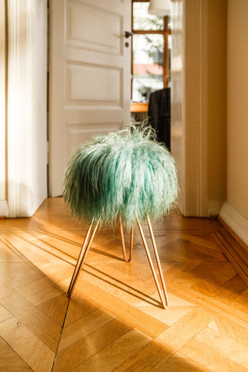 Hairpin stool on hardwood floor