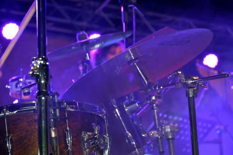 Close-up of drum kit at music concert