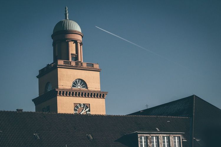 Low angle view of witten town hall against sky