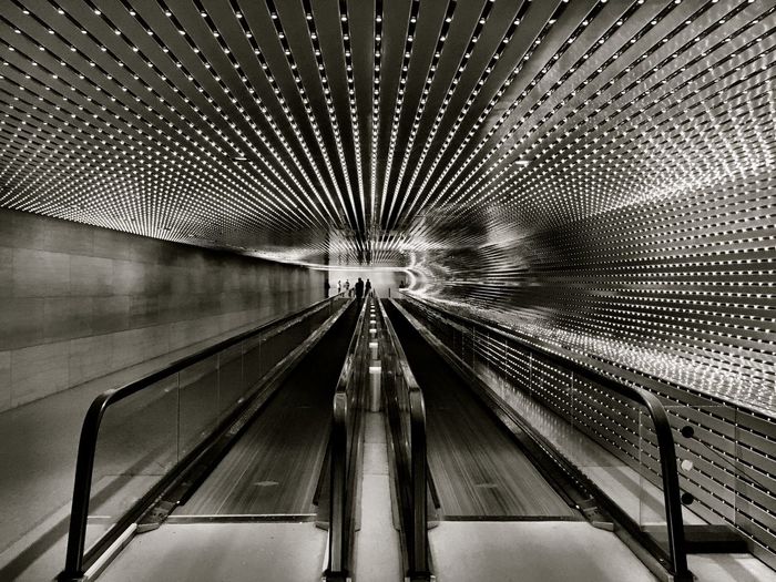 Interior of illuminated subway station
