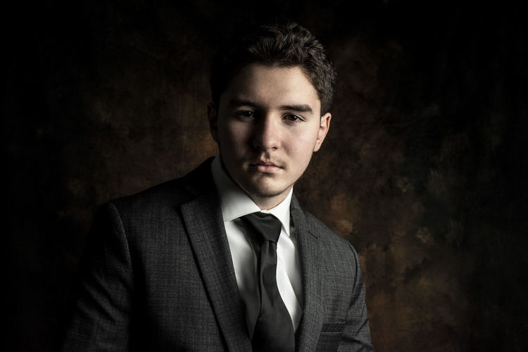 Portrait of teenage businessman
