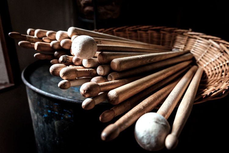 Close-up of drumsticks in basket