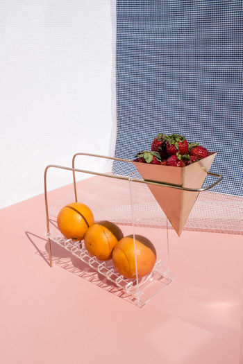 Fruits in basket on table