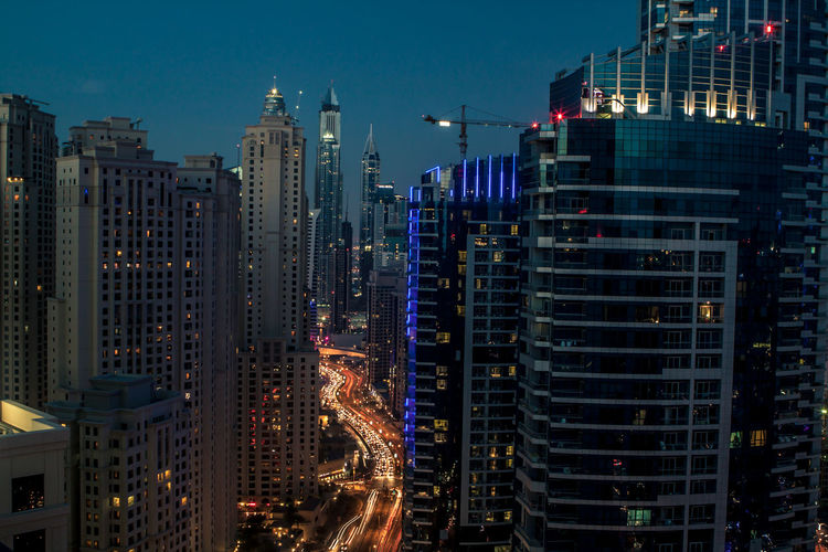 Illuminated cityscape at night