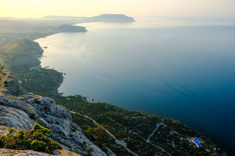 Beautiful landscape of the sea coast of crimea, view of sudak at dawn
