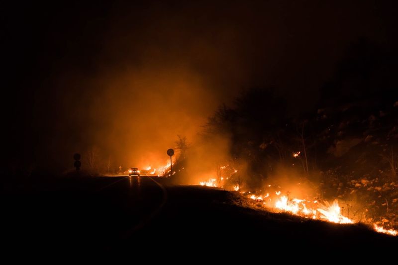 View of illuminated fire at night