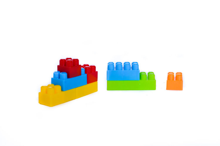 Close-up of toys against white background