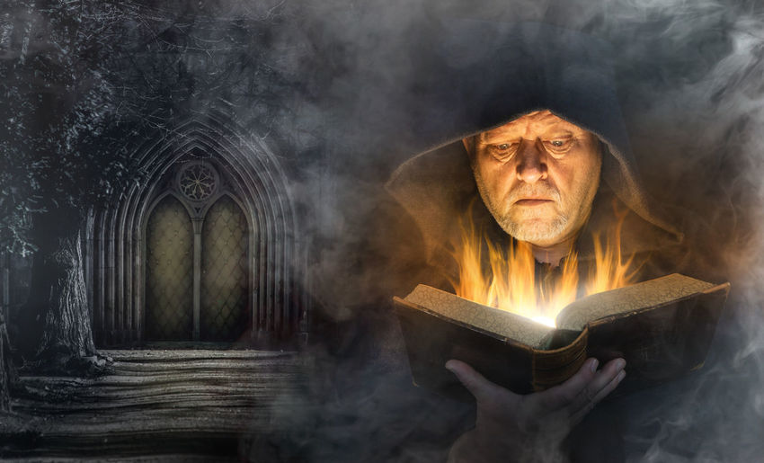 Digital composite image of man reading book