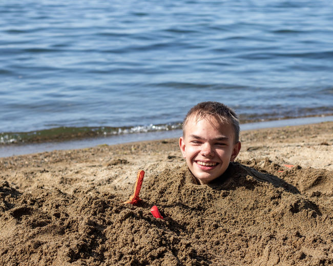 Portrait of boy on beach