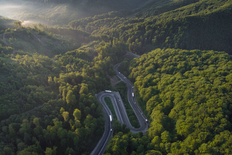 Summer aerial view of transalpina mountain road, at sunrise