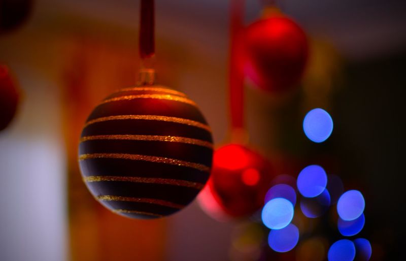 Close-up of christmas bauble against blurred background