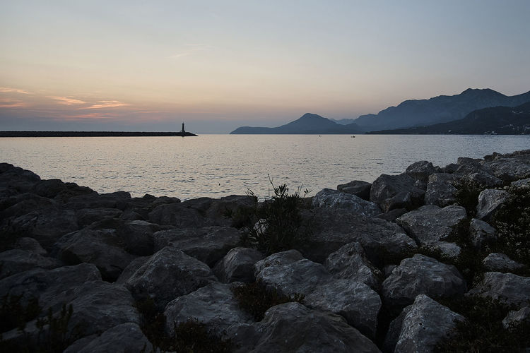 Scenic view of sea against sky during sunset