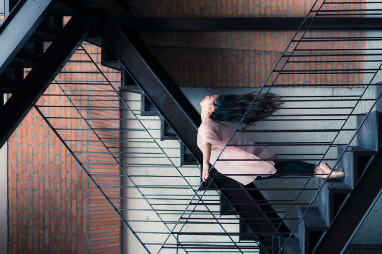 Side view of ballet dancer balancing on steps