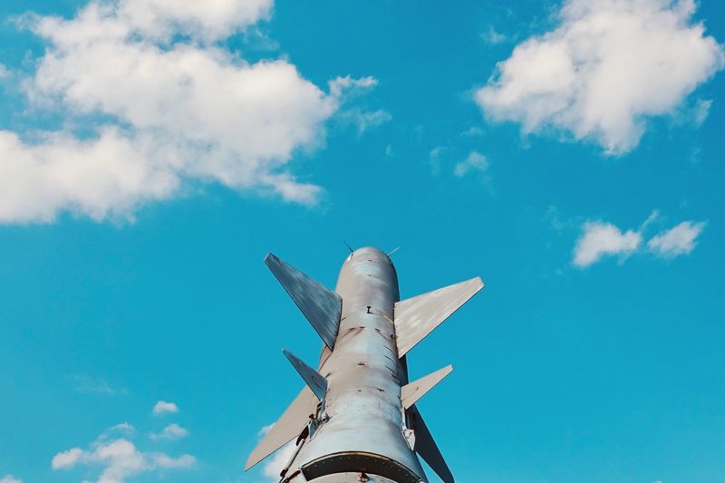 Low angle view of rocket against sky