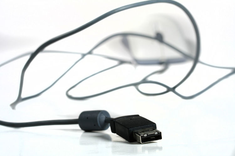 Close-up of computer mouse against white background