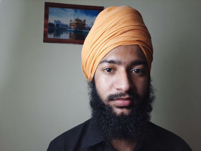 Portrait of young man wearing turban