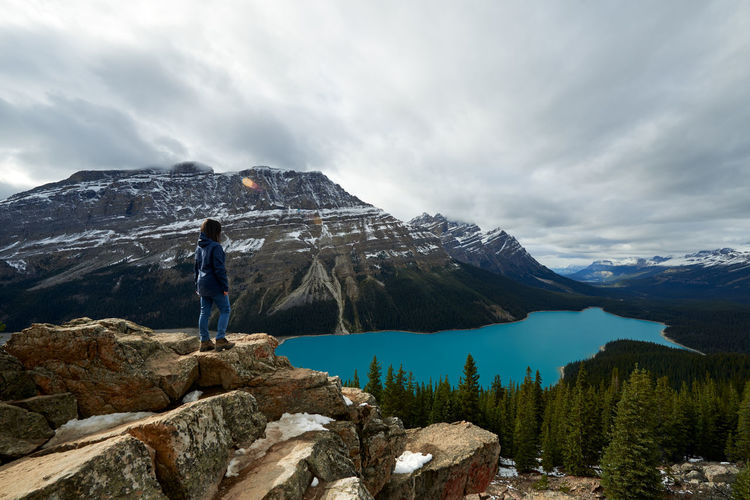Girl enjoying the view on a hike at peyto lake, banff national park