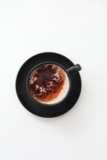 High angle view of coffee on white background
