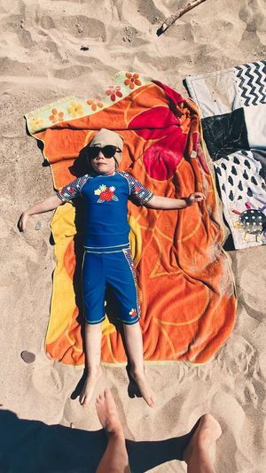 High angle view of child on beach