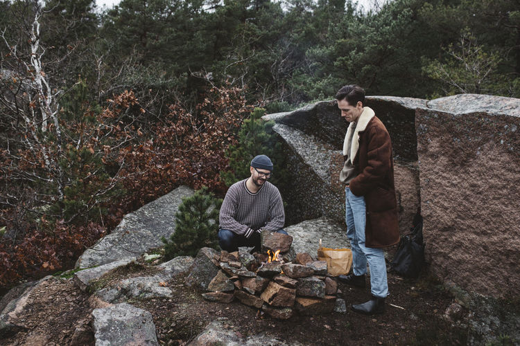 Men having campfire