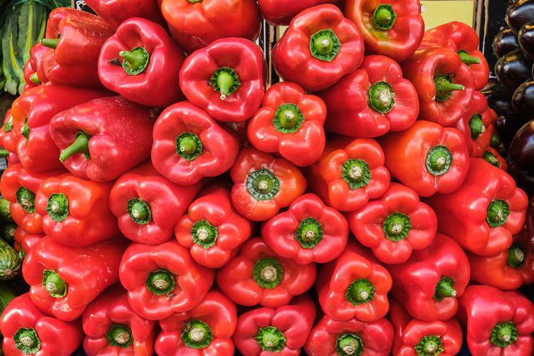 Pile of red bell pepper for sale at a market