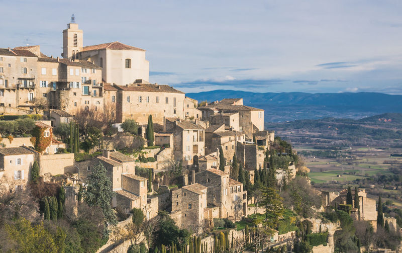 Panoramic view of gordes in provence against sky
