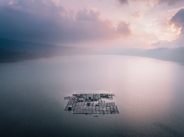 Aerial view of floating jetty in sea against sky