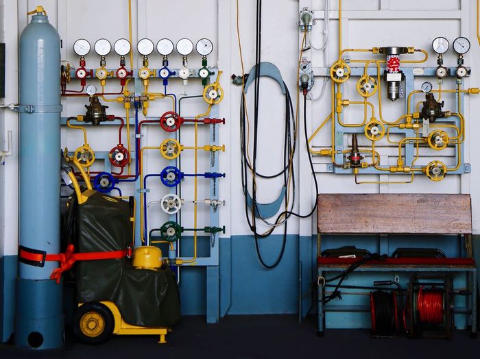 Colorful valves of ship in control room