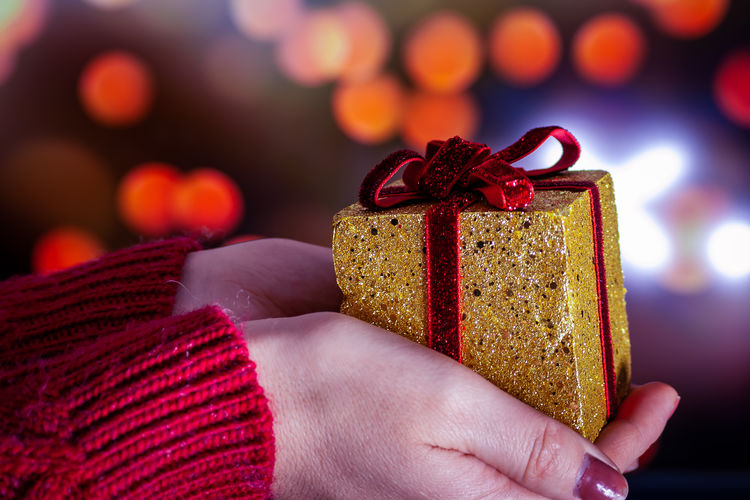 Close-up of hand holding christmas decoration